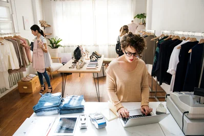 E-commerce business owner monitoring online store security